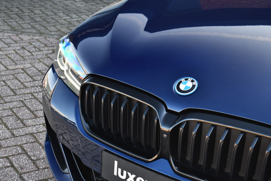 BMW 5 Serie 545e xDrive M-Sport Pano ACC HUD 20inch 360 Laser HiFi Adp-demping