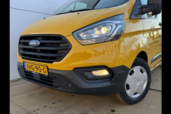 Ford Transit Custom 320 2.0 TDCI L2H1 Trend Trekhaak LED Airco Cruise Imperiaal Ladder Stoelverwarming Parkeersensoren Voor en Achter