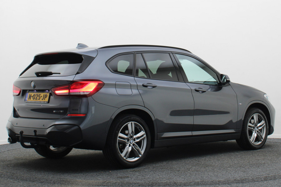BMW X1 sDrive18i High Executive M Sport Leer, ACC, Camera, Trekhaak, Navigatie, PDC, 18"
