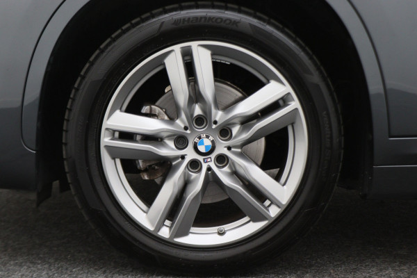 BMW X1 sDrive18i High Executive M Sport Leer, ACC, Camera, Trekhaak, Navigatie, PDC, 18"