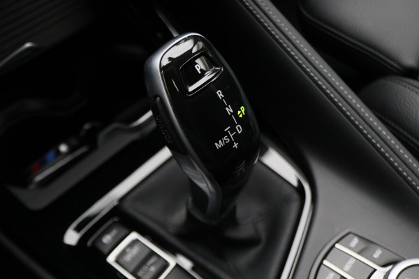 BMW X1 sDrive18i High Executive M Sport Leer, ACC, Camera, Trekhaak, Navigatie, PDC, 18"