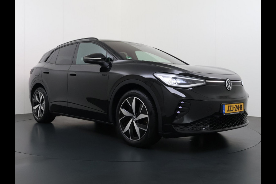 Volkswagen ID.4 GTX 4Motion 77 kWh VAN €34.900,- NU VOOR SLECHTS €30.877,- Uw LENTEVOORDEEL €4.023,-!300PK | SOH 89% | WARMTEPOMP | HEADUP DISPLAY | ACC CRUISE CONTROLE |  ELECTRISCHE TREKHAAK | MATRIX-LED-KOPLAMP (IQ.LIGHT) | STOEL + STUURWIELVERWARMING | RIJKLAAR GELEVERD MET 12 MND BOVAG GARANTIE