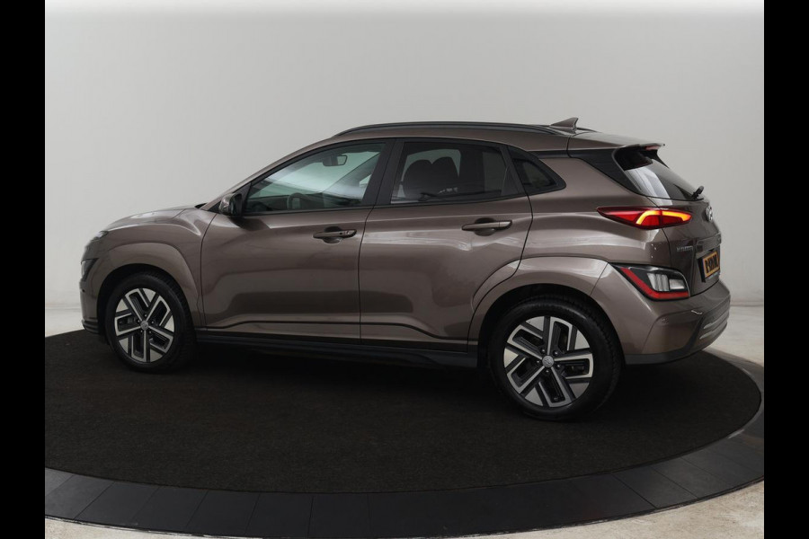 Hyundai Kona EV Fashion 64 kWh | SOH 100% | 3 Fase | Head-Up | Warmtepomp | Adaptive cruise | Camera | Carplay | Keyless | Full LED | Navigatie | Climate control