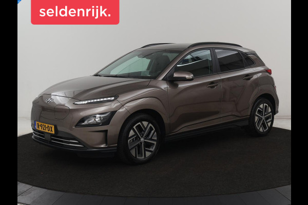 Hyundai Kona EV Fashion 64 kWh | SOH 100% | 3 Fase | Head-Up | Warmtepomp | Adaptive cruise | Camera | Carplay | Keyless | Full LED | Navigatie | Climate control