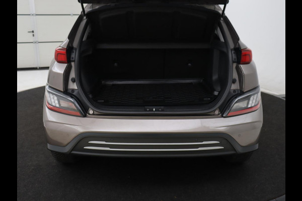 Hyundai Kona EV Fashion 64 kWh | SOH 100% | 3 Fase | Head-Up | Warmtepomp | Adaptive cruise | Camera | Carplay | Keyless | Full LED | Navigatie | Climate control
