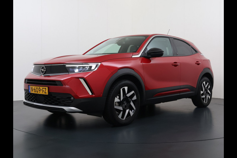 Opel Mokka-e 50kWh SOH 92% 3-Fase Laden Warmtepomp 360°Camera Apple Carplay Android Auto Pdc Navi Ecc Elegance SOH 92% DAB Led Lmv 17" Regen-Lichtsensor Isofix Privacy Glas Keyless Origineel Nederlandse Auto