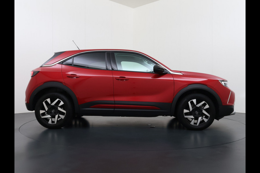Opel Mokka-e 50kWh SOH 92% 3-Fase Laden Warmtepomp 360°Camera Apple Carplay Android Auto Pdc Navi Ecc Elegance SOH 92% DAB Led Lmv 17" Regen-Lichtsensor Isofix Privacy Glas Keyless Origineel Nederlandse Auto