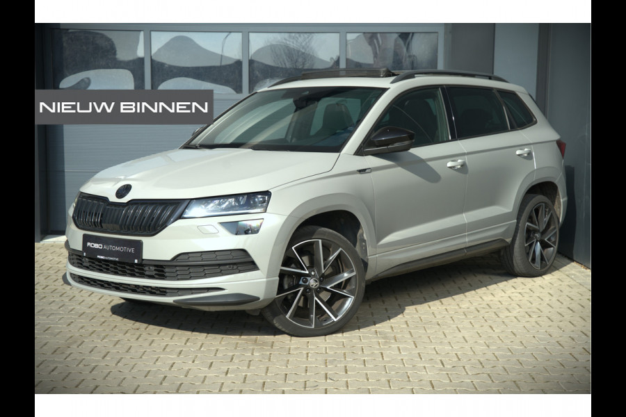 Škoda Karoq 1.5 TSI ACT Sportline Business | Panoramadak | Stoelverwarming | Stuurverwarming | Canton | Keyless | Apple Carplay | Camera | Adaptive Cruise Control | Dodehoekdetectie