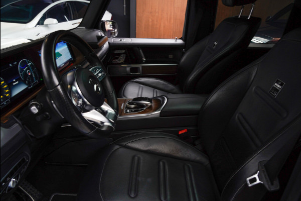 Mercedes-Benz G-Klasse BRABUS 800 Massage Burmester PTS 360° Camera Leer Navi Stoelventilatie Stoelverwarming voor en achter Climate voor & achter Memory seats Distronic Plus Elektr. bedienb. schuif-/ kanteldak PTS LM velgen