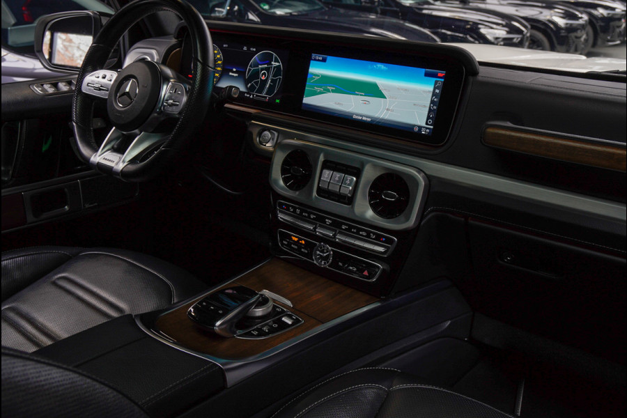 Mercedes-Benz G-Klasse BRABUS 800 Massage Burmester PTS 360° Camera Leer Navi Stoelventilatie Stoelverwarming voor en achter Climate voor & achter Memory seats Distronic Plus Elektr. bedienb. schuif-/ kanteldak PTS LM velgen