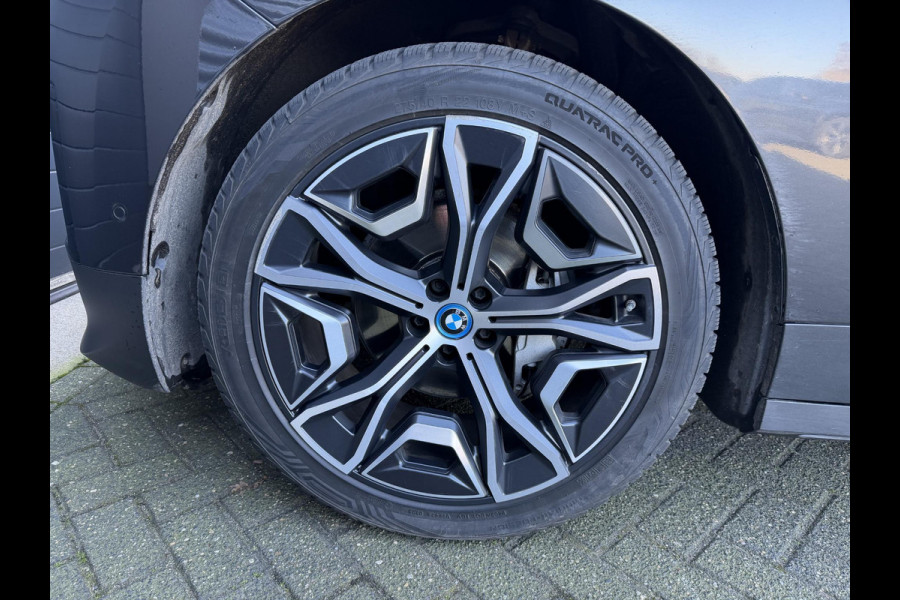BMW iX xDrive50 High Executive 112 kWh SOH 92% | Sky Lounge | 360* Camera | Massage | Stoelventilatie/Verwarming | Elektrische Trekhaak |