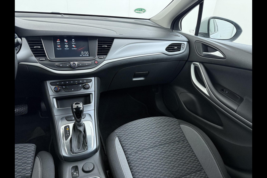 Opel Astra 1.4 Launch Elegance VAN € 18.900 ,- VOOR € 15.877,- UW LENTEVOORDEEL € 3.023,-! | AUTOMAAT | AGR STOELEN | CAMERA | STOEL- & STUURWIELVERWARMING | NAVIGATIE | GOED ONDERHOUDEN | AFNEEMBARE TREKHAAK | INCL. 12 MND BOVAG GARANTIE