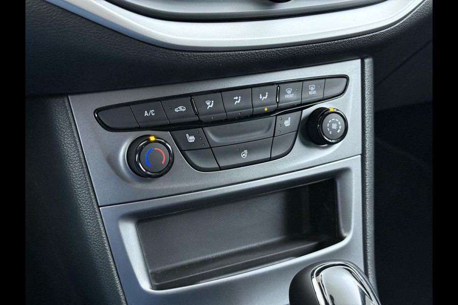 Opel Astra 1.4 Launch Elegance VAN € 18.900 ,- VOOR € 15.877,- UW LENTEVOORDEEL € 3.023,-! | AUTOMAAT | AGR STOELEN | CAMERA | STOEL- & STUURWIELVERWARMING | NAVIGATIE | GOED ONDERHOUDEN | AFNEEMBARE TREKHAAK | INCL. 12 MND BOVAG GARANTIE