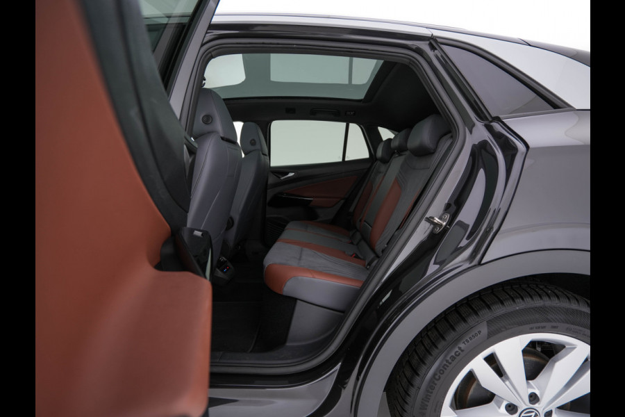 Volkswagen ID.4 First Max 77 kWh [ 3-Fase ] {SOH-81%} (INCL.BTW) Aut. *PANO | HEAD-UP | LEATHER-FABRIC | FULL-LED | MEMORY-PACK | TOP-VIEW | BLIND-SPOT | HEATED-SPORTSEATS | DIGI-COCKPIT | DAB+ | 19''ALU*