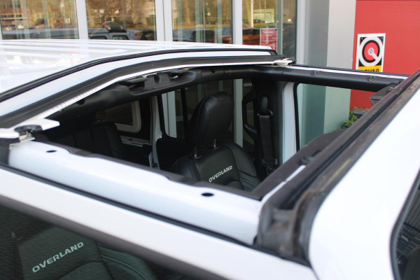 Jeep Wrangler Unlimited 4xe 380PK SAHARA OVERLAND | TRAILRATED | NAVIGATIE | APPLE CARPLAY/ANDROID AUTO | ACHTER/VOOR CAMERA | UITNEEMBARE DAKPLATEN | HARDTOP IN KLEUR | LEDEREN BEKLEDING | STOEL/STUUR VERWARMING | LED KOPLAMPEN | ADAPTIVE CRUISE CONTROL | TREE PLANKEN | HARD WHEELCOVER |