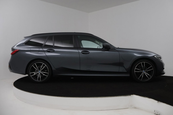 BMW 3 Serie Touring 318i High Executive Edition (PANORAMADAK, TREKHAAK, STOELVERWARMING, CAMERA, NAVIGATIE, PARKEERSENSOREN)