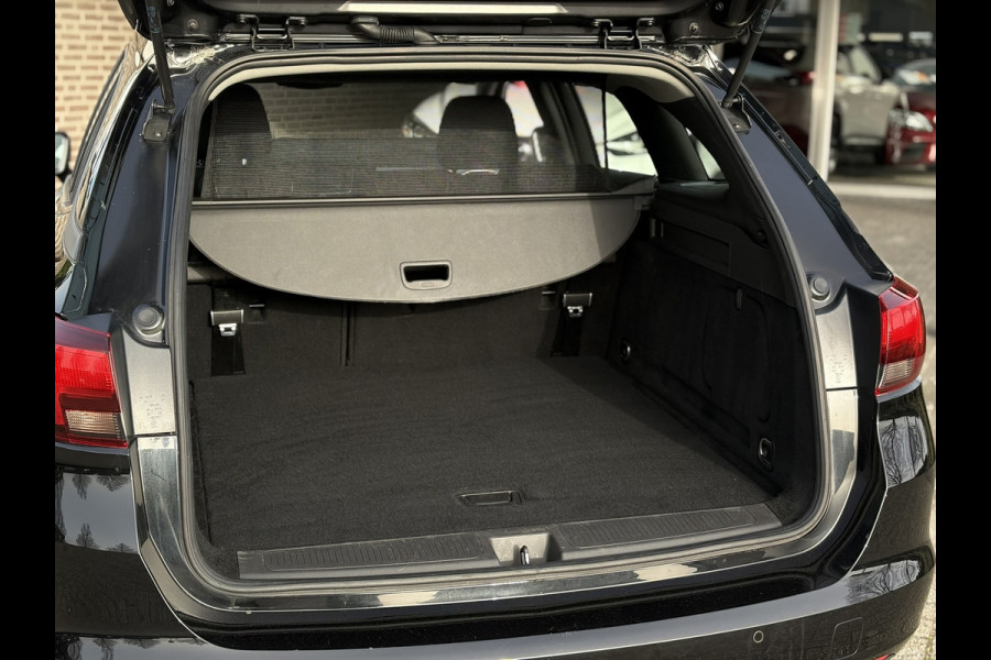 Opel Astra Sports Tourer 1.2 Business Edition | Carplay/Android, PDC, Cruise, Climate, Trekhaak | NAP |