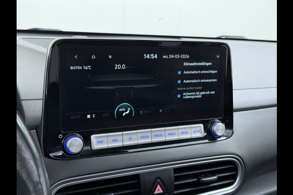 Hyundai Kona EV 64kWh 204pk SOH 100% Premium Schuif-/Kanteldak Leer Warmtepomp Head-Up Display Apple Carplay Android Navi Camera Elektr.Stoel Pdc Subwoofer Bluetooth Dodehoek detector Privacy Glas Rijstrooksensor 1e Eigenaar Origineel Nederlandse Auto Volledig Dealeronderhouden