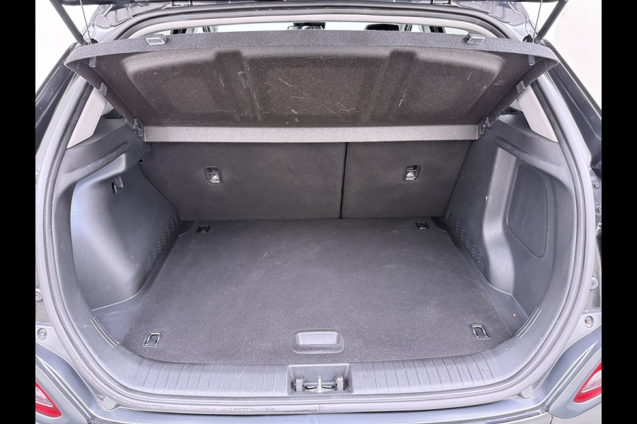 Hyundai Kona EV 64kWh 204pk SOH 100% Premium Schuif-/Kanteldak Leer Warmtepomp Head-Up Display Apple Carplay Android Navi Camera Elektr.Stoel Pdc Subwoofer Bluetooth Dodehoek detector Privacy Glas Rijstrooksensor 1e Eigenaar Origineel Nederlandse Auto Volledig Dealeronderhouden