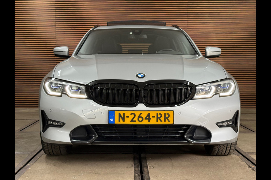 BMW 3 Serie Touring 320e Sportline | Pano | Leder | Laser | Shadow Line | Trekhaak elektr. | 18 inch | Stoelverwarming