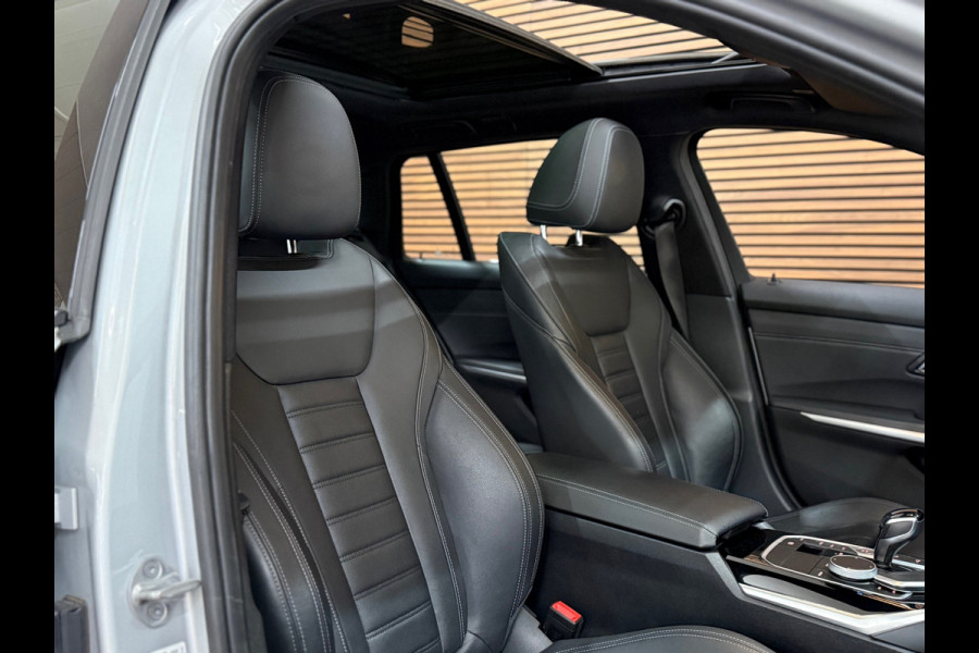 BMW 3 Serie Touring 320e Sportline | Pano | Leder | Laser | Shadow Line | Trekhaak elektr. | 18 inch | Stoelverwarming