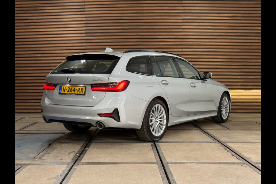 BMW 3 Serie Touring 320e Sportline | Pano | Leder | Laser | Shadow Line | Trekhaak elektr. | 18 inch | Stoelverwarming
