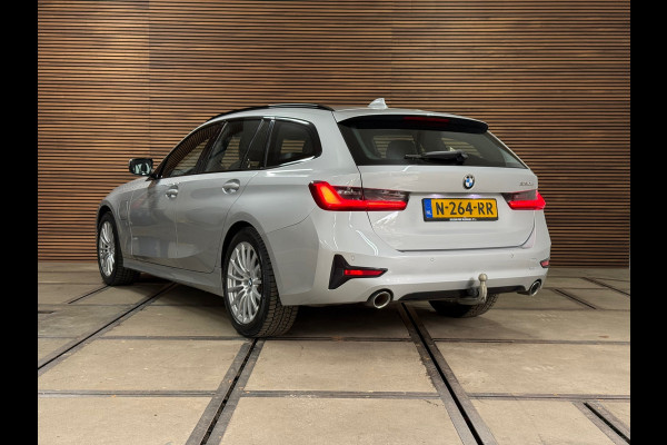 BMW 3 Serie Touring 320e Sportline | Pano | Leder | Laser | Shadow Line | Trekhaak elektr. | 18 inch | Stoelverwarming