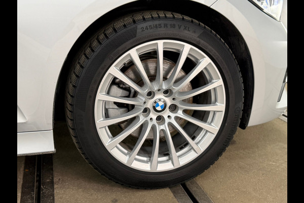 BMW 3 Serie Touring 320e Sportline | Pano | Leder | Laser | Shadow Line | Trekhaak elektr. | 18 inch | Stoelverwarming