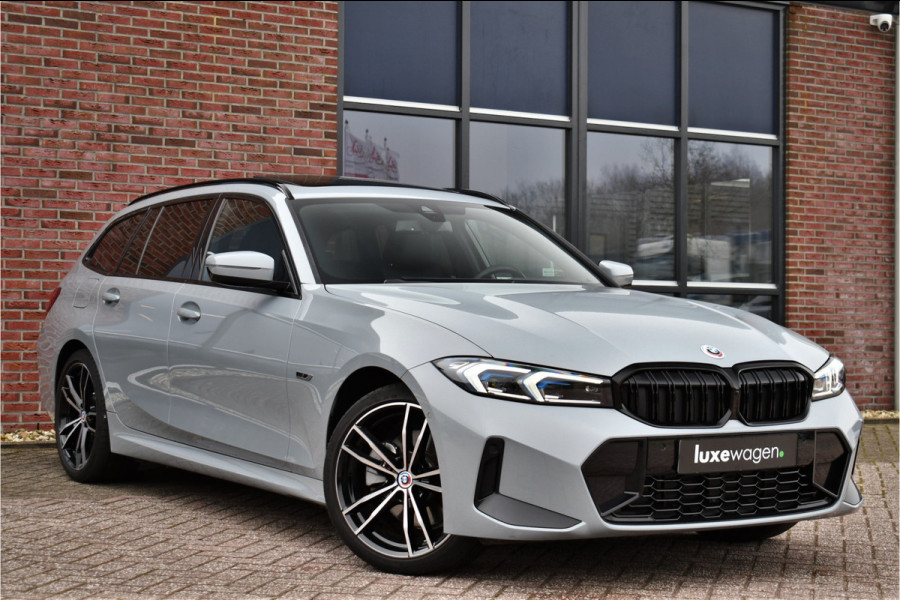 BMW 3 Serie Touring 330e M-Sport Brooklyn Pano HUD 19inch HiFi