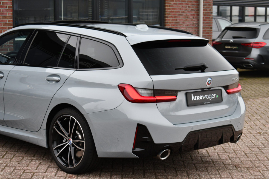 BMW 3 Serie Touring 330e M-Sport Brooklyn Pano HUD 19inch HiFi