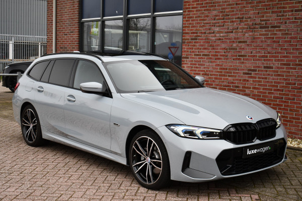 BMW 3 Serie Touring 330e M-Sport Brooklyn Pano HUD 19inch HiFi