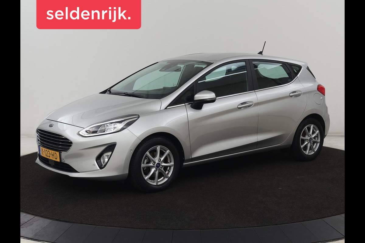 Ford Fiesta 1.0 EcoBoost Titanium | Automaat | 1e eigenaar | Stoelverwarming | Adaptive cruise | Camera | Carplay | Navigatie | Dodehoek detectie | Stuurverwarming | Full LED | Park Assist