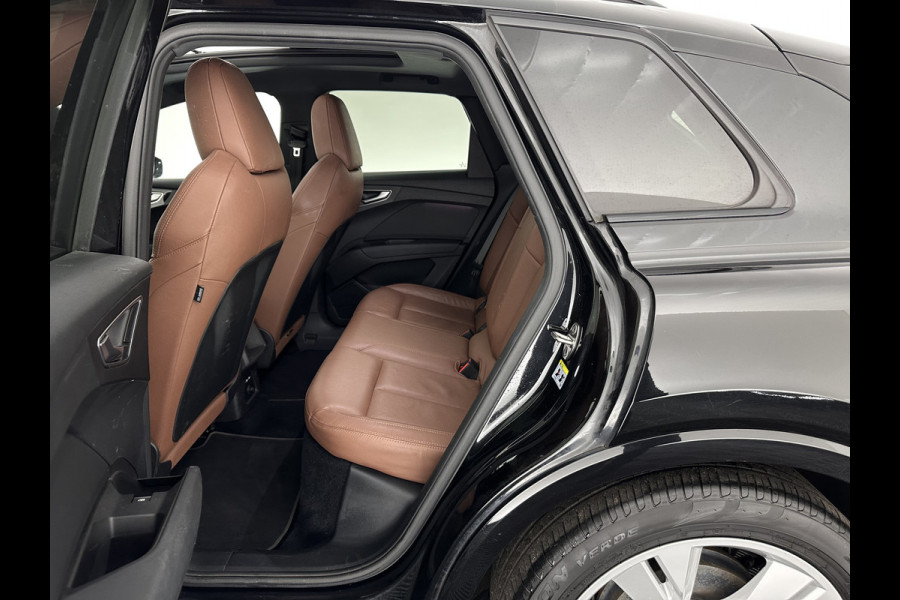 Audi Q4 e-tron 40 S-Line Launch-edition Competition 77 kWh [ 3-Fase-11kW ] {SOH-90%} (INCL-BTW) Aut. *HEATPUMP | PANO | LEATHER | MATRIX-LED | AUDI-SOUND | ADAPTIVE-CRUISE | HEATED-SPORTSEATS | AMBIENTLIGHT | DIGI-COCKPIT | CAMERA | KEYLESS | DAB+ | 20''ALU*