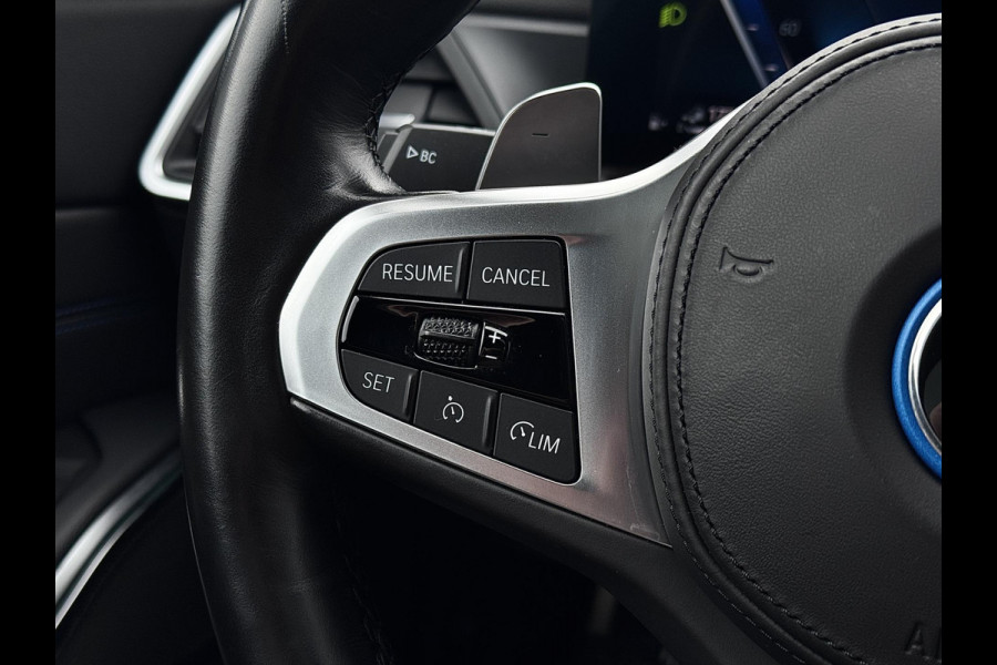 BMW 3 Serie Touring 320e | M-Sport | Pano | Harman Kardon | 19 inch | Carbon | Stuurwiel verwarmd | Individual | Brooklyn Grey