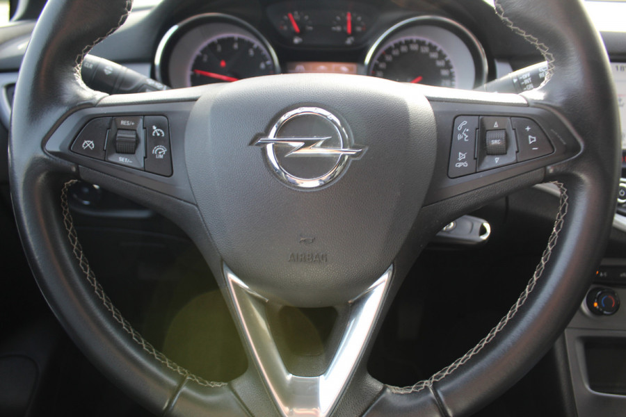 Opel Astra 1.0 Turbo Online Edition 5deurs , zeer nette auto Climate control , Cruise control , Navigatie , Bluetooth Parkeersensoren achter en voor