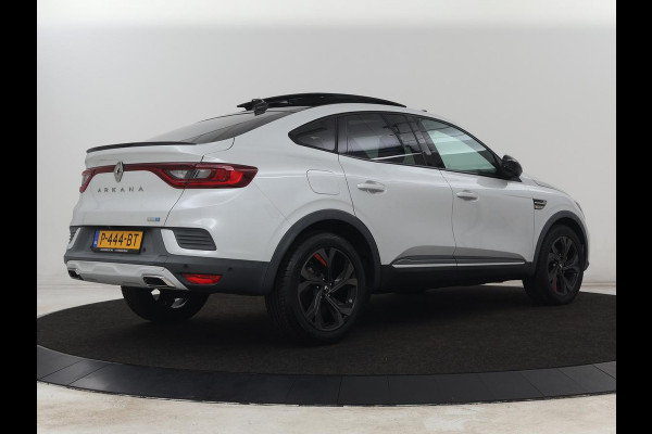 Renault Arkana 1.6 E-Tech Hybrid 145 R.S. Line | Panoramadak | Leder/Alcantara | Trekhaak | Stoelverwarming | Adaptive cruise | Camera | Carplay | Keyless | Park Assist | Full LED | Navigatie | Stuurverwarming