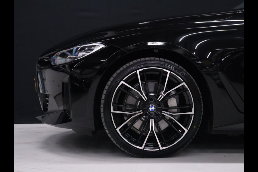 BMW i4 eDrive40 84 kWh [SCHUIFKANTELDAK, ADAPTIVE CRUISE CONTROL, APPLE CARPLAY, ANDROID AUTO, ACHTERUITRIJCAMERA, PDC V+A,STUURVERWARMING, BMW LED, NIEUWSTAAT]