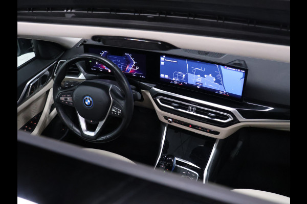 BMW i4 eDrive40 84 kWh [SCHUIFKANTELDAK, ADAPTIVE CRUISE CONTROL, APPLE CARPLAY, ANDROID AUTO, ACHTERUITRIJCAMERA, PDC V+A,STUURVERWARMING, BMW LED, NIEUWSTAAT]