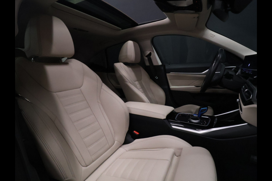 BMW i4 eDrive40 84 kWh [SCHUIFKANTELDAK, ADAPTIVE CRUISE CONTROL, APPLE CARPLAY, ANDROID AUTO, ACHTERUITRIJCAMERA, PDC V+A,STUURVERWARMING, BMW LED, NIEUWSTAAT]