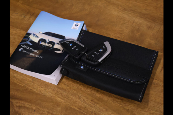 BMW i4 eDrive40 84 kWh [SCHUIFKANTELDAK, ADAPTIVE CRUISE CONTROL, APPLE CARPLAY, ANDROID AUTO, ACHTERUITRIJCAMERA, PDC V+A,STUURVERWARMING, BMW LED, NIEUWSTAAT]