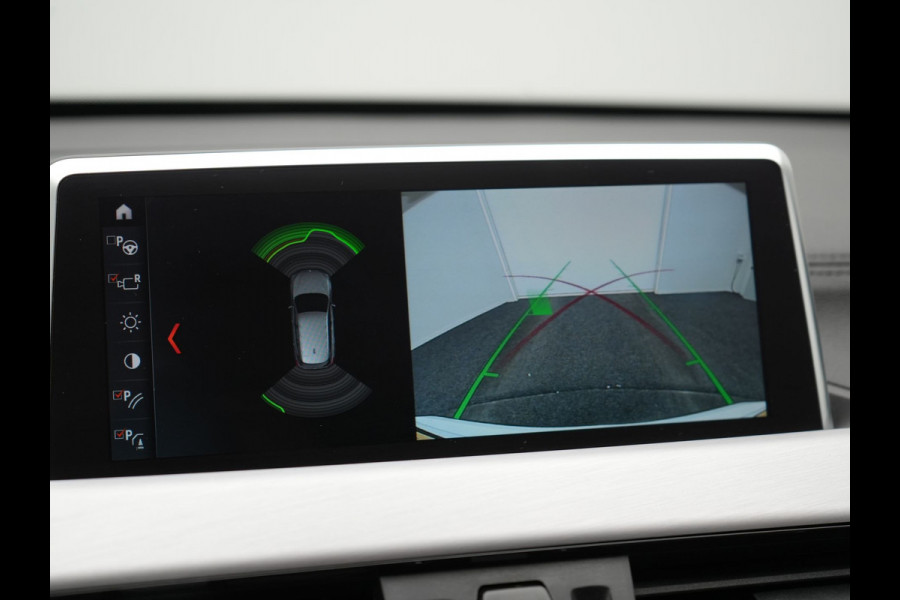 BMW X1 xDrive25e Sportline Plug In Hybrid 221pk Dealer O.H. PHEV | Trekhaak Afn. | Camera | Sportstoelen Memory & Verwarmd | Keyless | Sfeerverlichting | Adaptive LED | Cruise Control | Navigatie | DAB |