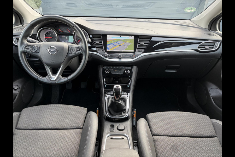 Opel Astra Sports Tourer 1.4 Innovation Dealer Onderhouden,Navi,Camera,Trekhaak,150pk,Keyless,Rijstrooksensor,Halfleder,2e Eigenaar,Lm velgen,BSD,PDC V+A,N.A.P,Apk tot 12-2026