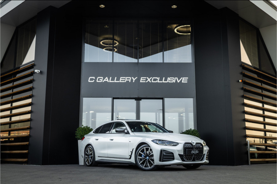 BMW i4 M50 High Executive 84 kWh - M Sport | Panorama | Carbon | 360 Camera | Sportstoelen
