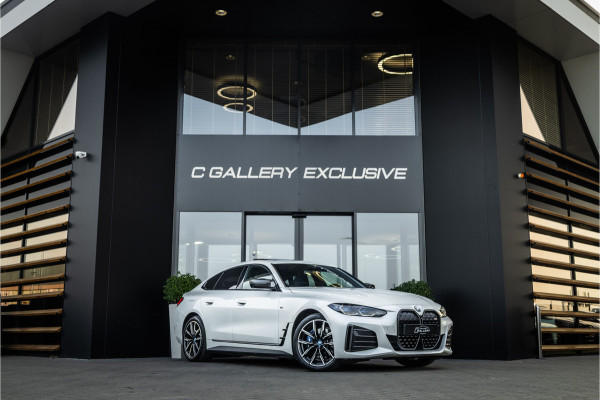 BMW i4 M50 High Executive 84 kWh - M Sport | Panorama | Carbon | 360 Camera | Sportstoelen