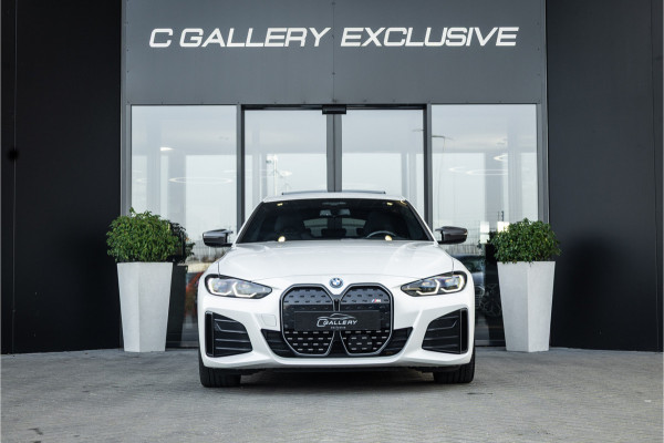 BMW i4 M50 High Executive 84 kWh - M Sport | Panorama | Carbon | 360 Camera | Sportstoelen