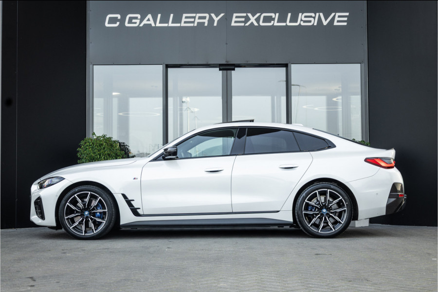 BMW i4 M50 High Executive 84 kWh - M Sport | Panorama | Carbon | 360 Camera | Sportstoelen
