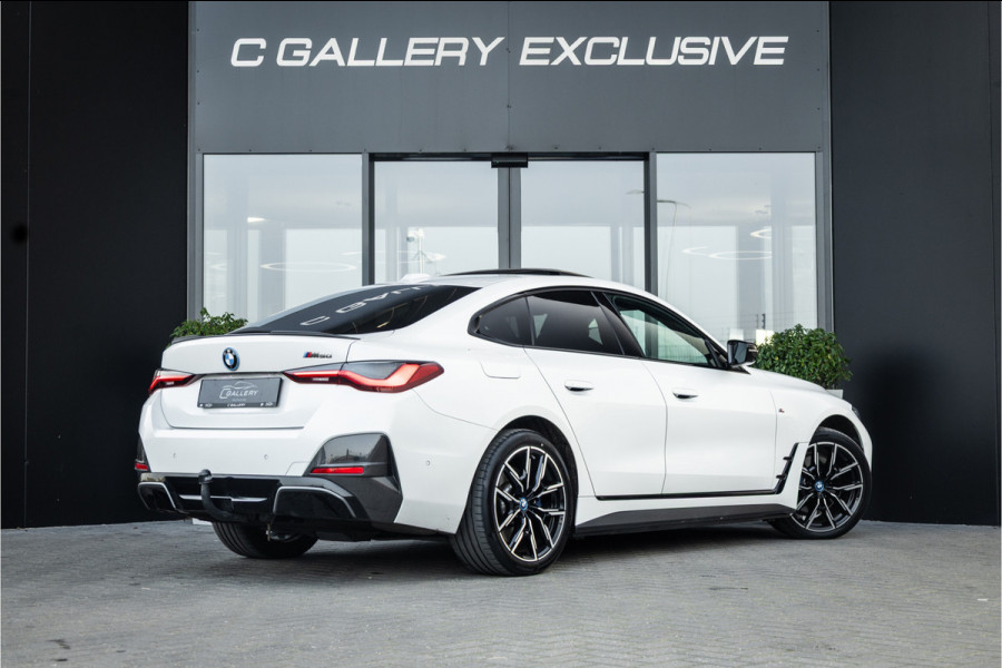 BMW i4 M50 High Executive 84 kWh - M Sport | Panorama | Carbon | 360 Camera | Sportstoelen
