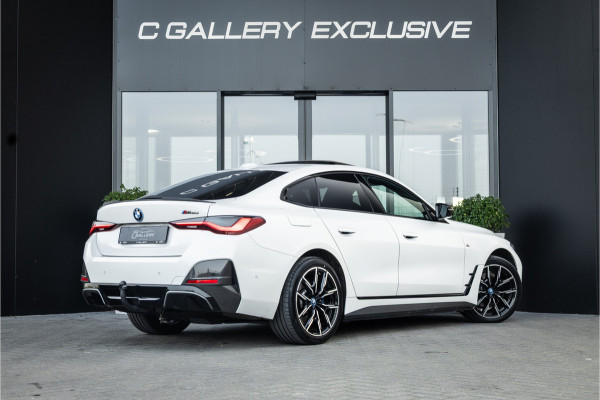 BMW i4 M50 High Executive 84 kWh - M Sport | Panorama | Carbon | 360 Camera | Sportstoelen