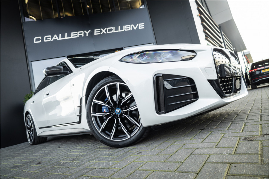 BMW i4 M50 High Executive 84 kWh - M Sport | Panorama | Carbon | 360 Camera | Sportstoelen