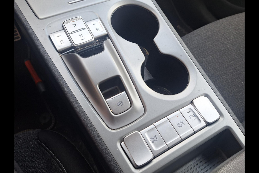 Hyundai Kona EV Fashion 64 kWh | SOH: nnb | Trekhaak | 3 Fase | Warmtepomp | HUD | Navi | Adaptive CC | Blindspot |